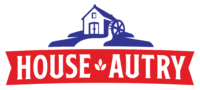 House Autry logo featuring a red banner with the text "HOUSE AUTRY," accompanied by an illustration of a house and a watermill, representing a brand in the food manufacturing sector focused on breader and dry mixes.
